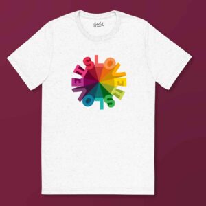 A white t-shirt with a rainbow design that says Love is Love in a circular design