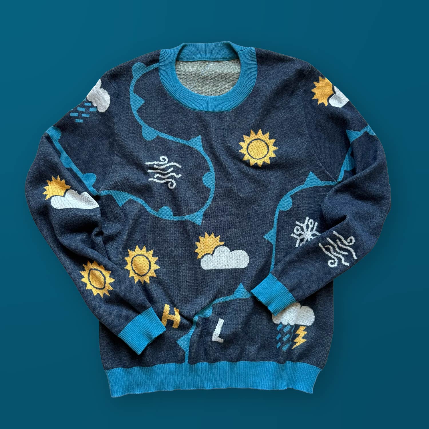 A blue sweater with weather forecast graphics