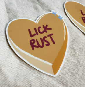 "Lick Rust" Conversation Heart Sticker (Matte)
